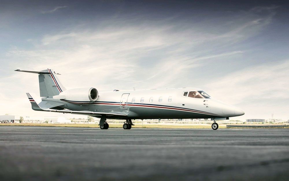 The Learjet 60 as an Air Ambulance on the runway getting ready to take off for a medevac